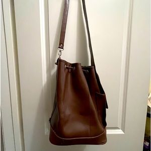 Brown shoulder/ sling backpack